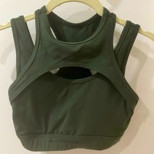 MOVING SALE. LOTS OF ALPHALETE CHECK OTHER LISTINGS! Never worn XS olive green